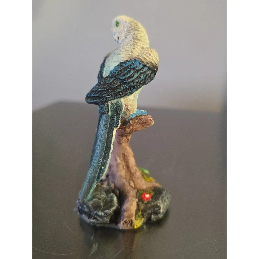 Blue parakeet‎ Bird Figure on Branch